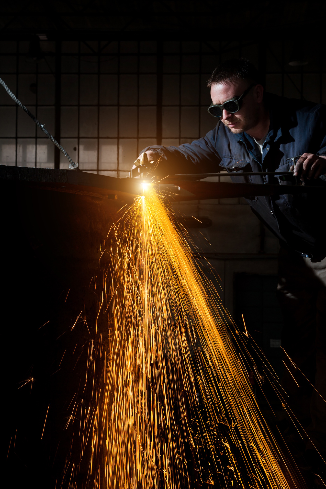 Welder working at the factory